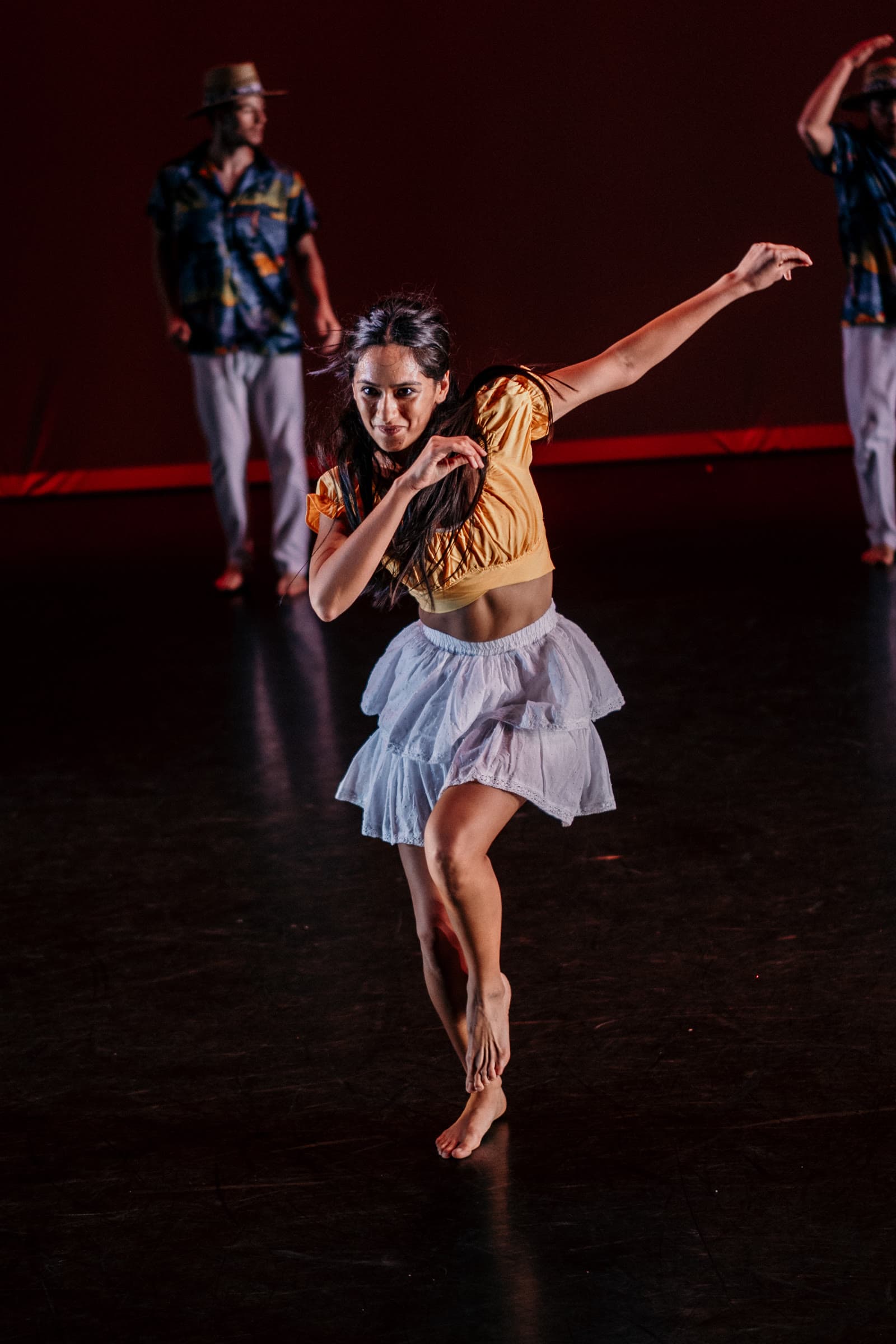 Dance company performing on stage